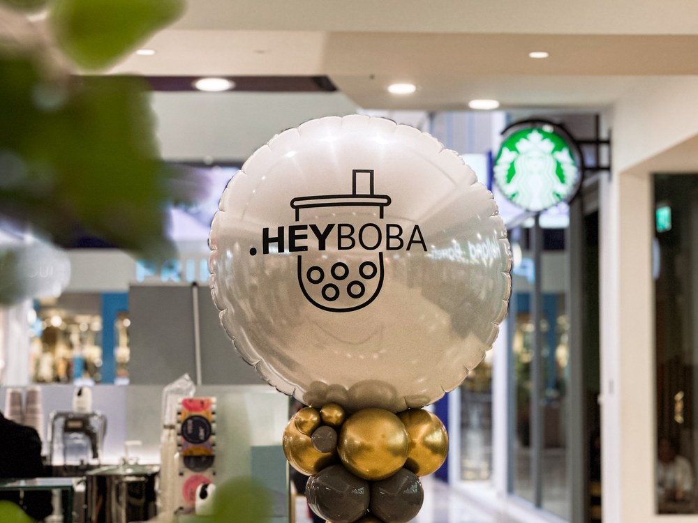 HEYBOBA branded launch balloon inside a store