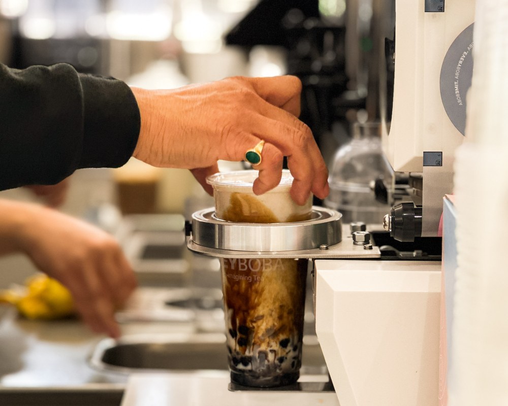 A brown sugar bubble tea being freshly prepared